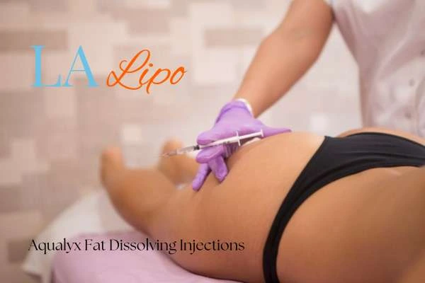 Woman having fat dissolving injections Burgess Hill on thighs