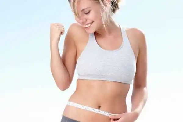 woman happy after fat reduction treatment Burgess Hill