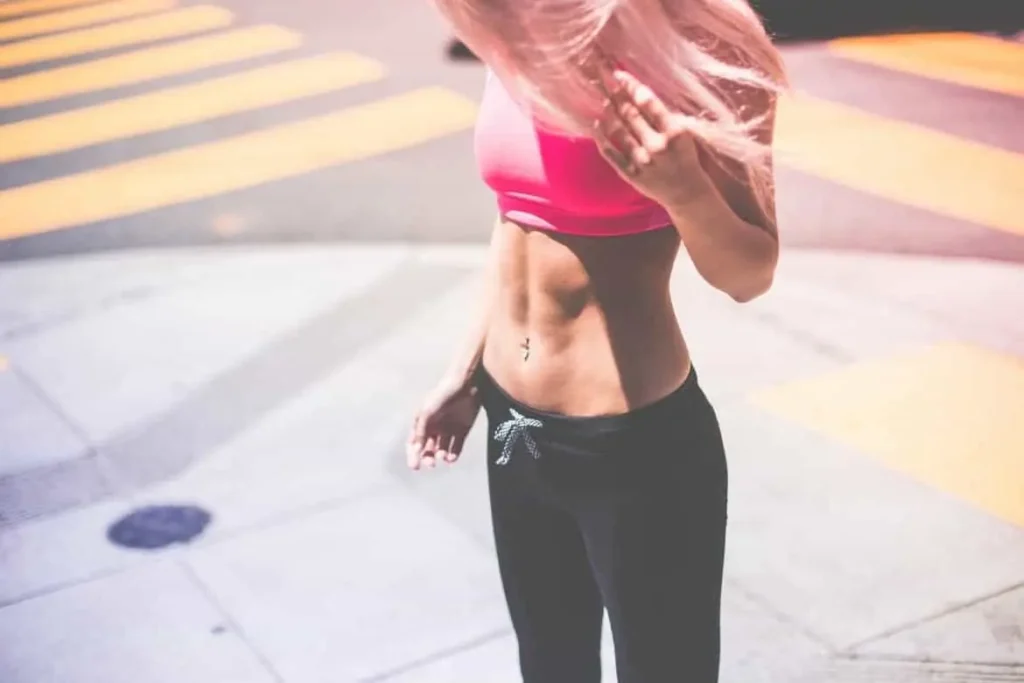 Woman with toned stomach after LA-EMS Body Sculpting Treatment Burgess Hill 